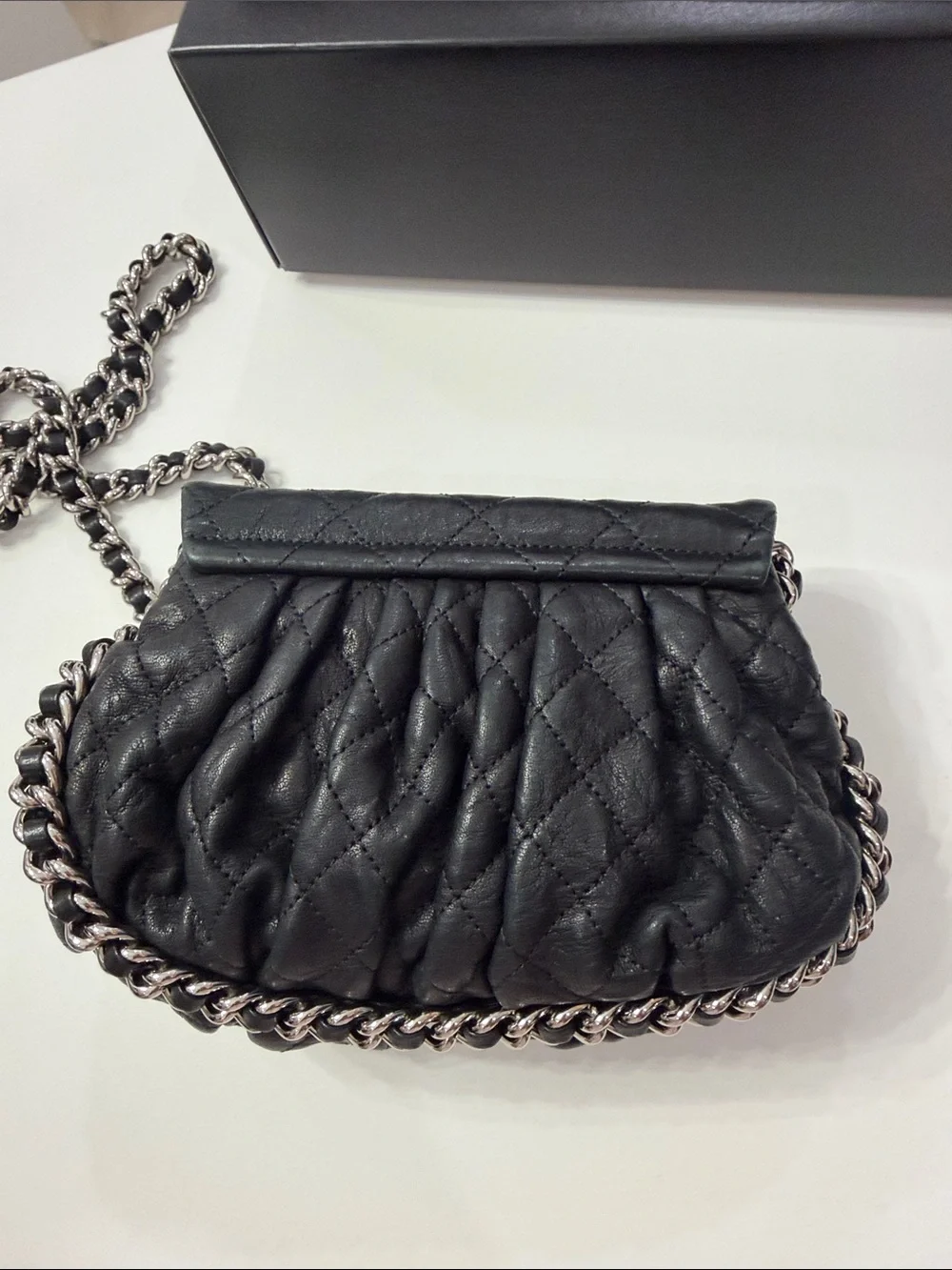 CHANEL Black Quilted leather chain around Crossbody with Silver CC Chain